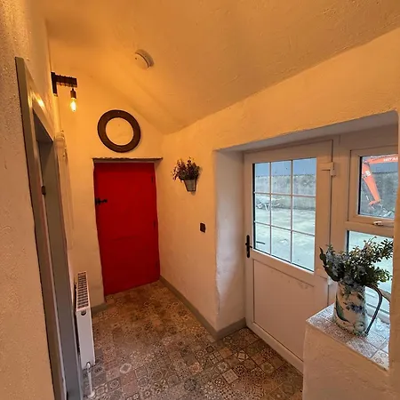 Teach Neil Mhanais *