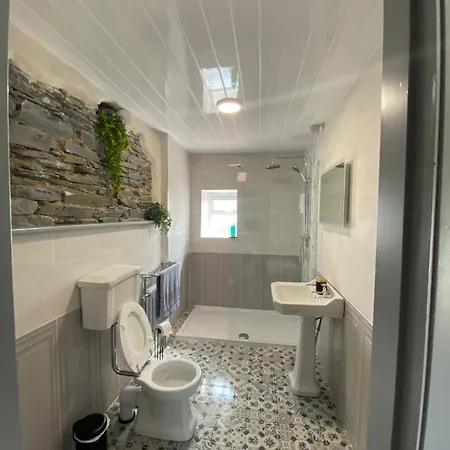 Teach Neil Mhanais *